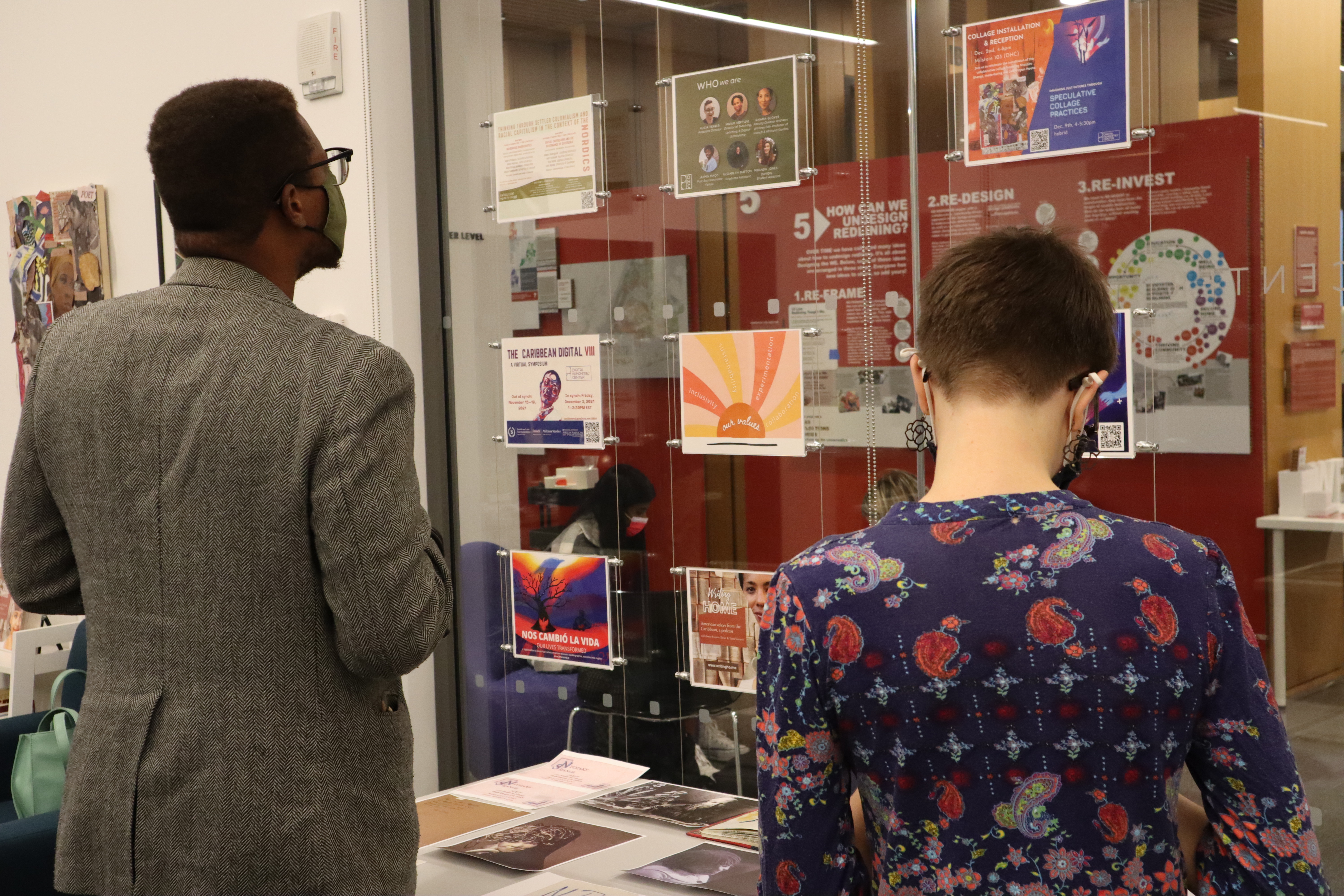 Two people are seen visiting the DHC Collage Reception